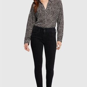 Vince Camuto animal print faux wrap top.